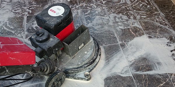 Black Marble Tile Being Restored